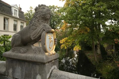 Bruges bridge statue Stock Photos