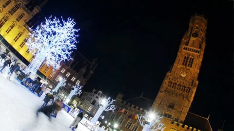 Brugge, Belgium at Christmas time : old historic buildings and winter market Stock Footage 99973953