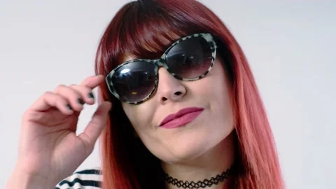 The Bruised Redhead Looks Directly At The Camera. Violence Against Women. Stock-Footage 142683612