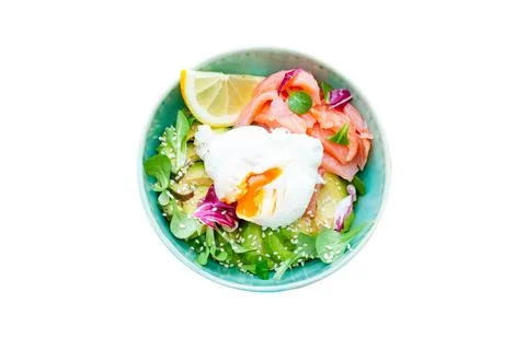 Brunch with poached egg, avocado, arugula, flax seeds and salted salmon iso.. Stock Photos