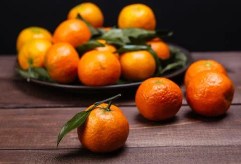 Brunch of tangerines Stock Photos