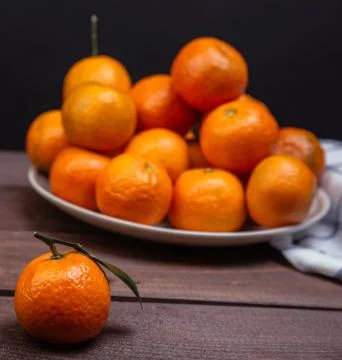 Brunch of tangerines Stock Photos