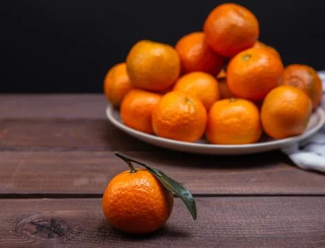 Brunch of tangerines Stock Photos