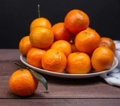 Brunch of tangerines Stock Photos
