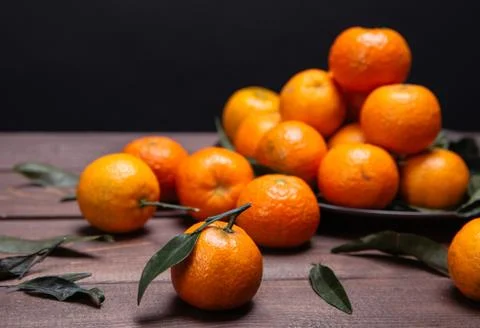 Brunch of tangerines Stock Photos