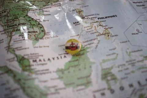 Brunei flag drawing pin on the map Stock-Fotos
