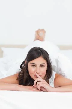 Brunette asking for silence Photos
