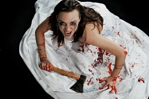 Brunette with axe Stock Photos