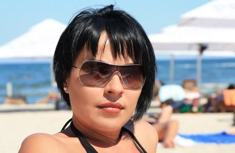 Brunette at the beach Stock Photos