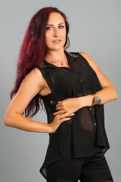 Brunette on a gray background Stock Photos