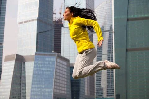 Brunette jumping Stock Photos