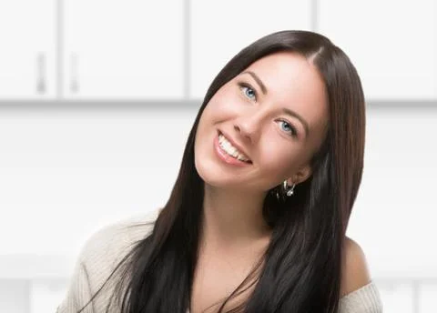 Brunette in the kitchen Stock Photos