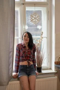 Brunette in the kitchen Stock Photos