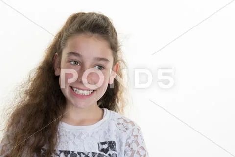 Brunette little girl isolated on a over white background Stock Photos