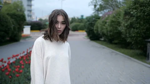 Brunette is looking at camera Stock Footage 91892780