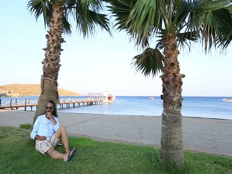 Brunette man relaxing Stock Footage 73587907