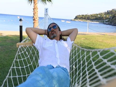 Brunette man relaxing Stock Footage 73611959