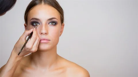 Brunette model getting makeup. Stock Footage 96299897
