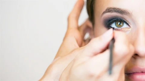 Brunette model getting makeup. Stock Footage 96300003