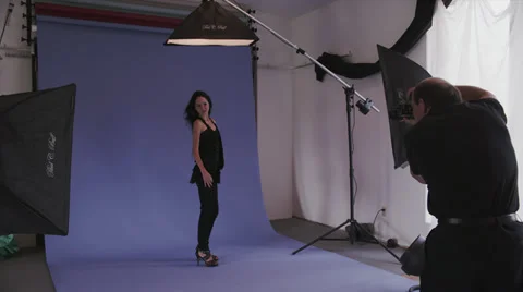 Brunette Model Poses Under Flashing Lights Stock Footage 35298416