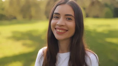 Brunette model posing green grass background portrait Stock Footage 275341060