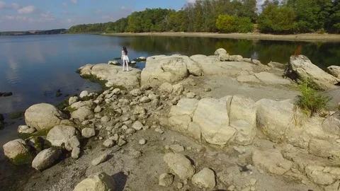 Brunette Model Posing On A Riverside Stock Footage 73763205