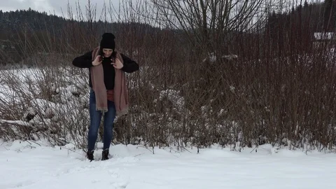 Brunette posing in winter outside Stock Footage 105678115