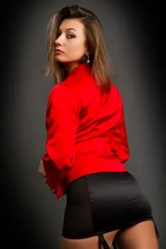 Brunette in a red jacket Stock Photos