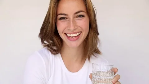 Brunette refreshes Stock Footage 80499561