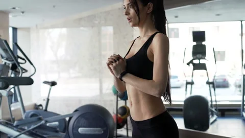 Brunette with slender physique working out squats slowmo. One person 20s 30s wit Stock Footage 199490801