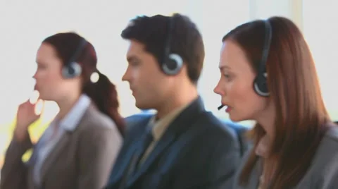 Brunette speaking over the headset Stock Footage 1097937