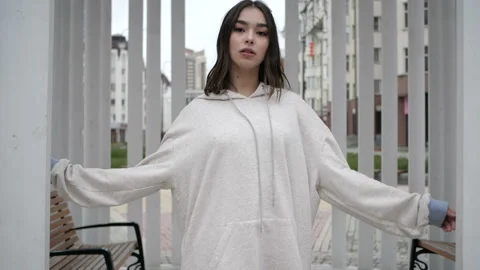 Brunette is standing among the columns Video stock 91897060