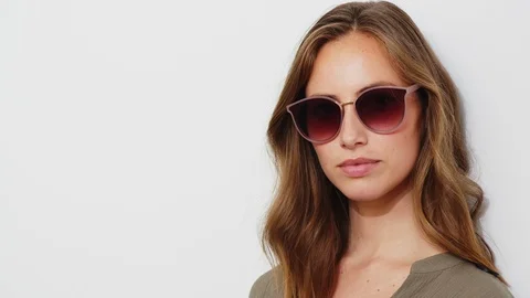Brunette In Sunglasses Winking Stock Footage 117438414
