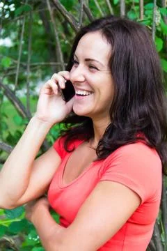 Brunette talking by cellular Stock Photos