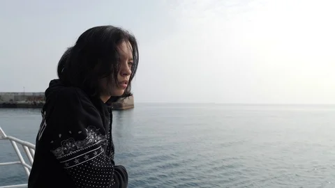 Brunette thinking on the ship Stock Footage 103271449