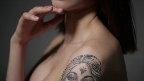 Brunette is touching her cheek Stock Footage 93381943