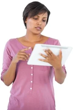 Brunette using her tablet pc Foto stock
