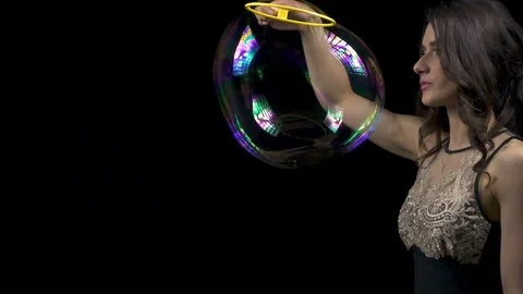 Brunette woman and soap bubbles Stock Footage