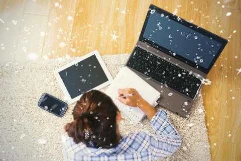 Brunette young student using her tablet and notebook for doing homework Stock Illustration