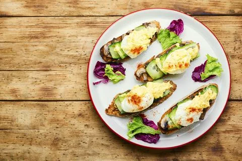 Bruschetta with eggs benedict Stock Photos