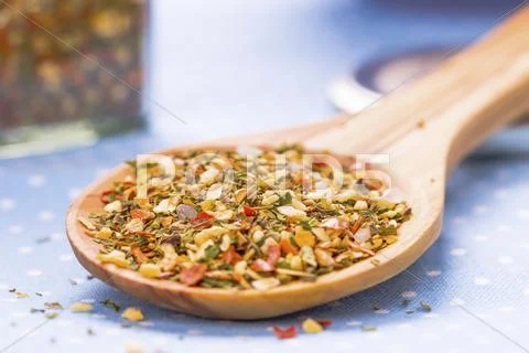 Bruschetta Spice Mix On A Wooden Spoon (Close-Up)