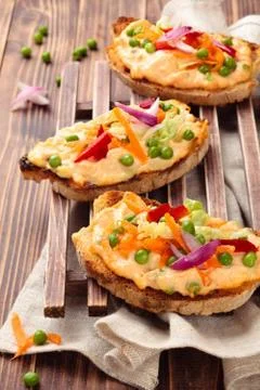 Bruschetta with spring vegetables. Stock Photos