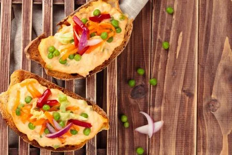 Bruschetta with spring vegetables. Stock Photos