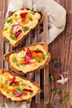 Bruschetta with spring vegetables. Stock Photos
