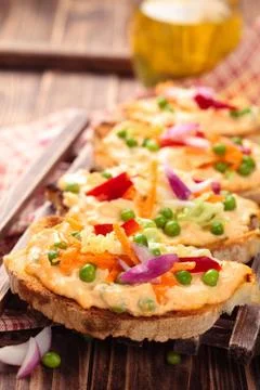 Bruschetta with spring vegetables. Stock Photos