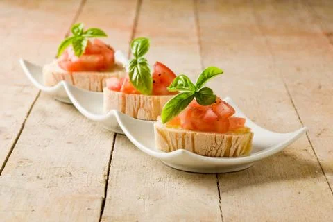 Bruschetta with tomatoes and basil Stock Photos