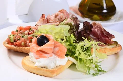 Bruschetta with various toppings Stock Photos
