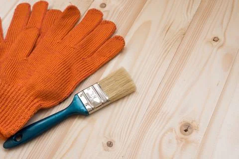 Brush and gloves Stock Photos
