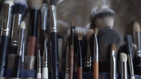 Brush background A makeup brush is a tool with bristles used for the application Stock Footage 82468844