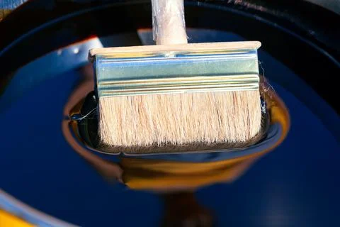 Brush in black paint Stock Photos